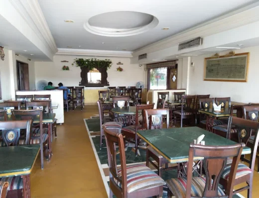 The Grand Vegetarian Restaurant – Pure Veg Rooftop Dining on Grand Road