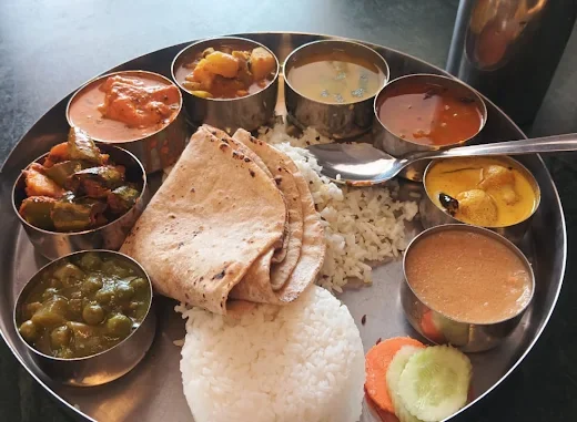 The Grand Vegetarian Restaurant – Pure Veg Rooftop Dining on Grand Road