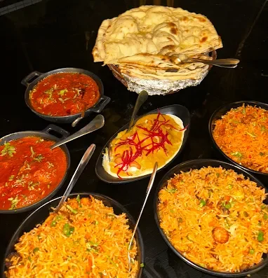 Divine Kitchen & Cafe – Multi-Cuisine Cafe & Restaurant with Rooftop